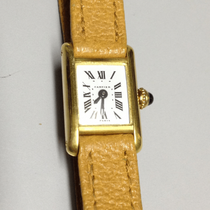 Cartier Mini Tank Ref: 3205 in Yellow gold. Circa: 1950.