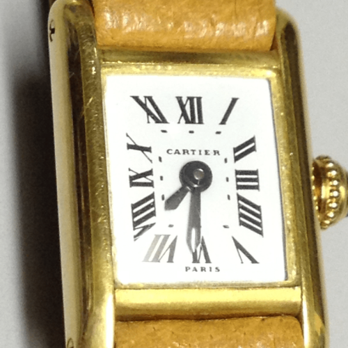 Cartier Mini Tank Ref: 3205 in Yellow gold. Circa: 1950.