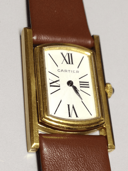 Cartier Tank Cabriolet in Yellow gold. Circa: 1960.