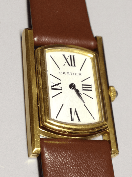 Cartier Tank Cabriolet in Yellow gold. Circa: 1960.