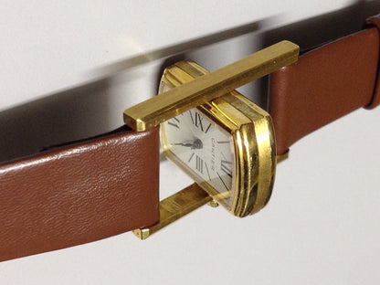 Cartier Tank Cabriolet in Yellow gold. Circa: 1960.