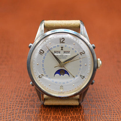 Gubelin Triple Calendar Moon Phase, yellow gold, guilloché dial, vintage Swiss craftsmanship, circa 1950.