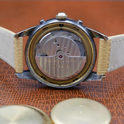 Gubelin Triple Calendar Moon Phase, yellow gold, guilloché dial, vintage Swiss craftsmanship, circa 1950.