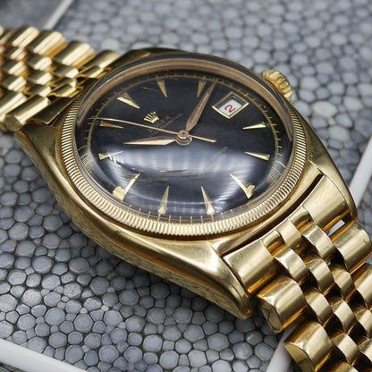 Rolex Oyster Perpetual Date Ref: 6075 in Yellow gold. Circa: 1950.
