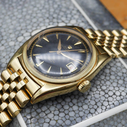 Rolex Oyster Perpetual Date Ref: 6075 in Yellow gold. Circa: 1950.