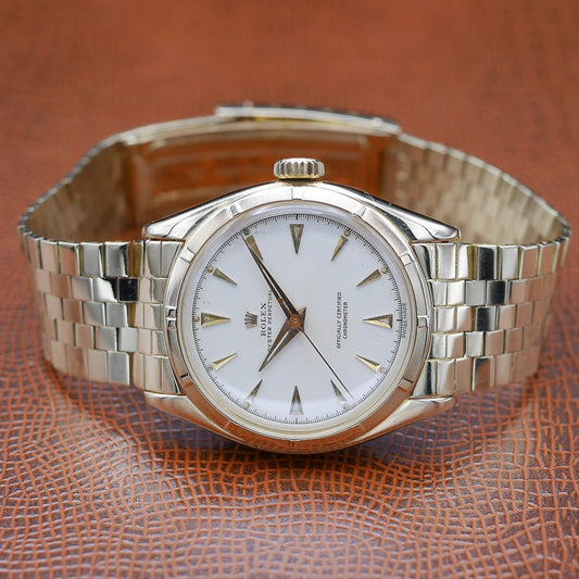 Rolex Oyster Perpetual Date Ref: 6085 in Yellow gold. Circa: 1956.