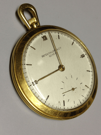 Vintage Patek Philippe pocket watch in yellow gold, circa 1940, featuring a small seconds subdial at 6 o’clock.