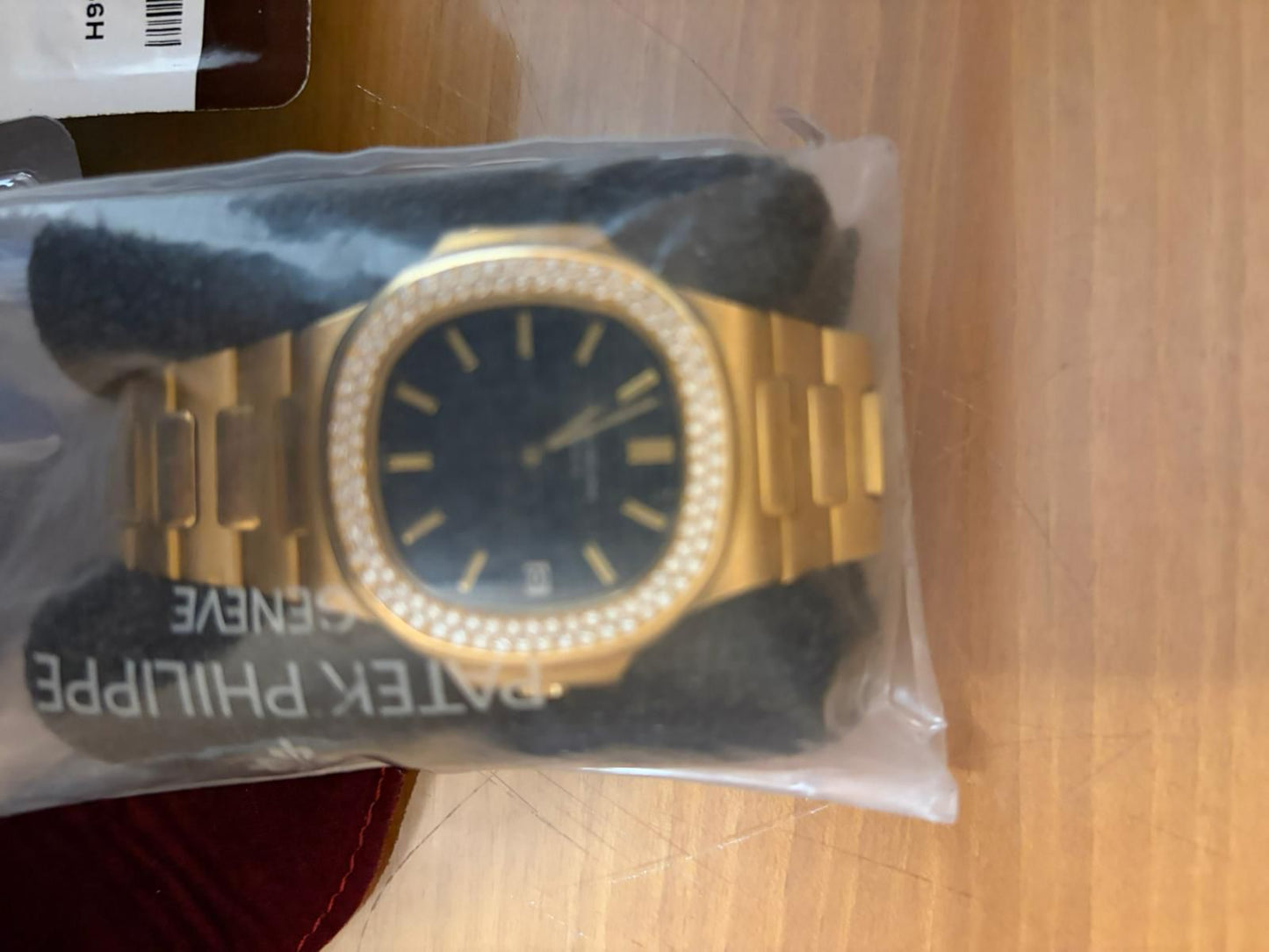 Patek Philippe Nautilus Ref. 3700/013 — 18kt Yellow Gold, Diamond Bezel