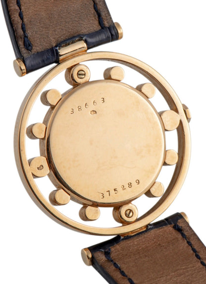 Vintage Cartier Gouvernail watch in yellow gold, circa 1960, featuring Breguet numerals, blue steel hands, and a unique cylindrical hour marker design.

