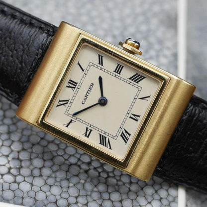 Cartier tank in Yellow gold. Circa: 1960.
