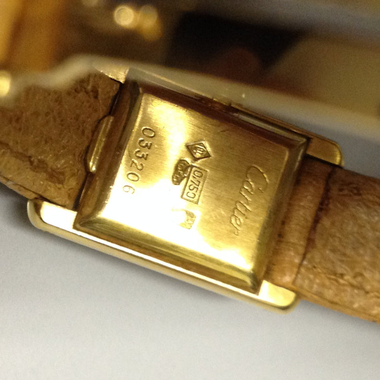 Cartier Mini Tank Ref: 3205 in Yellow gold. Circa: 1950.