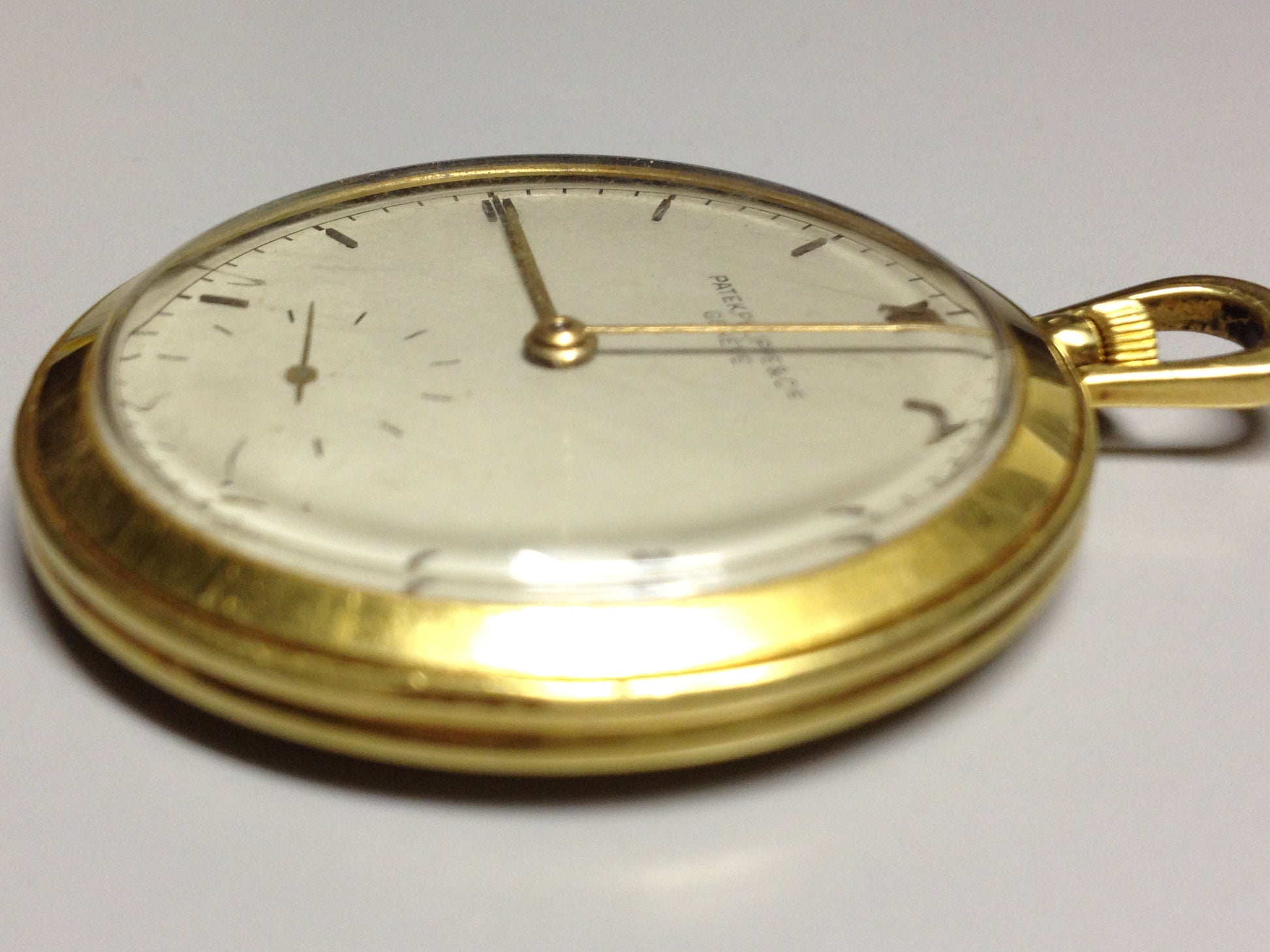 Vintage Patek Philippe pocket watch in yellow gold, circa 1940, featuring a small seconds subdial at 6 o’clock.
