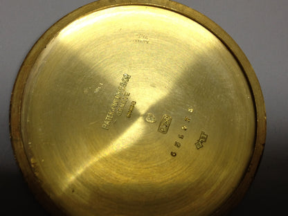 Vintage Patek Philippe pocket watch in yellow gold, circa 1940, featuring a small seconds subdial at 6 o’clock.