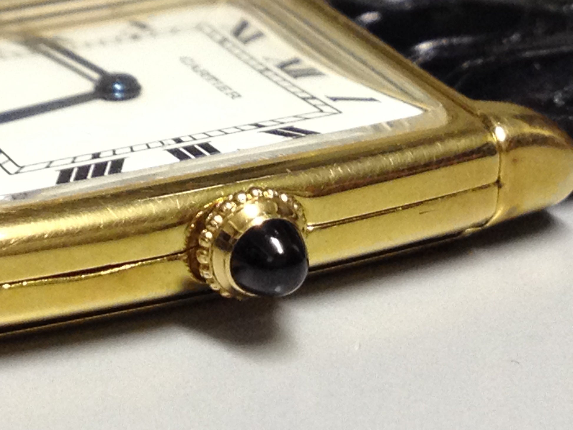 Cartier Tank with fold over case in Yellow gold. Circa: 1960.