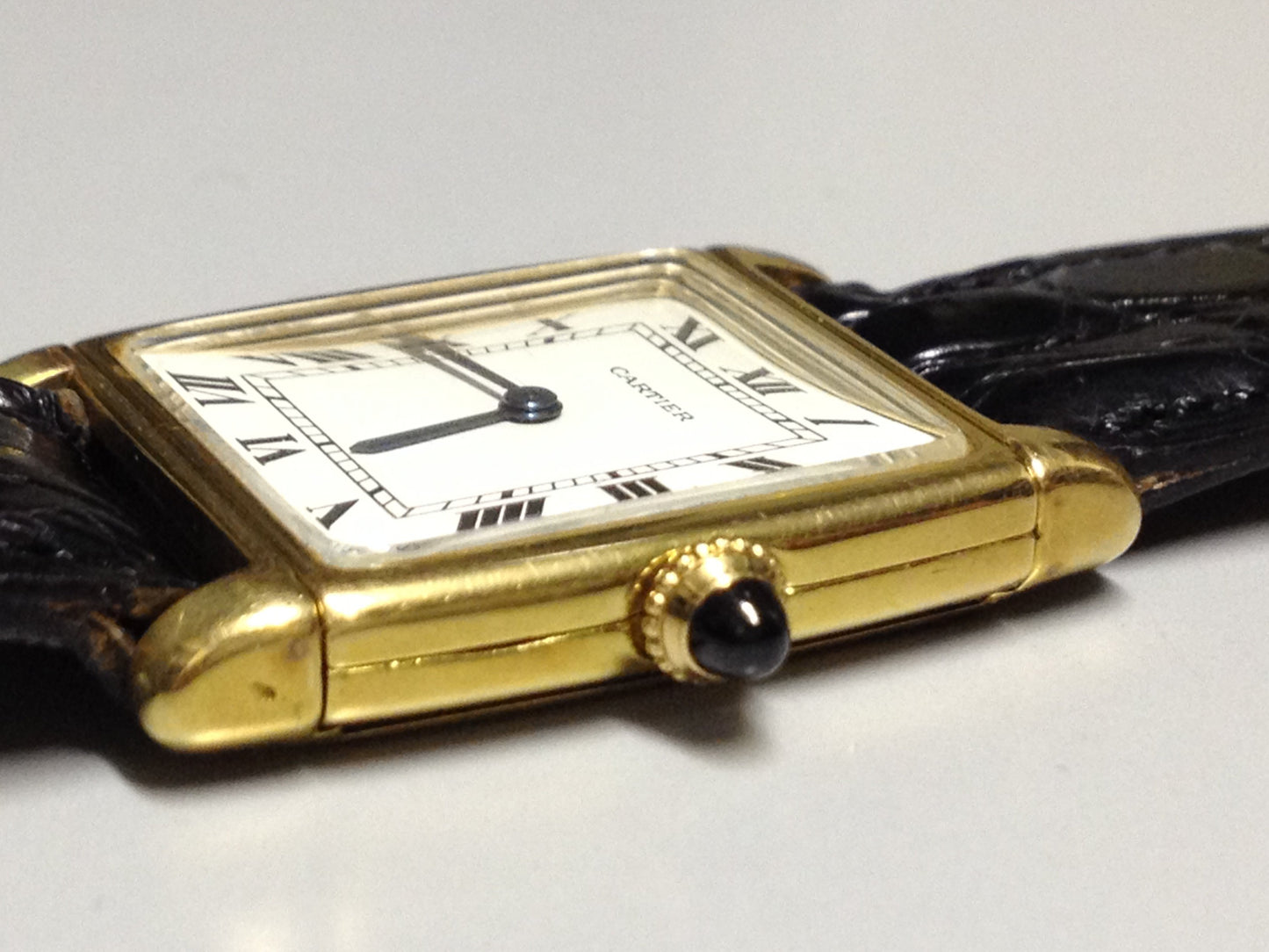 Cartier Tank with fold over case in Yellow gold. Circa: 1960.